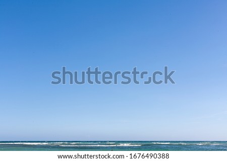 Gradient clear blue sky with sea horizon Royalty-Free Stock Photo #1676490388