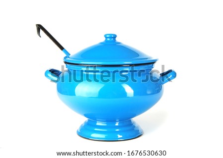 A blue metal tureen on white background Royalty-Free Stock Photo #1676530630