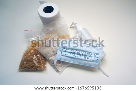 Set of basic products for the coronavirus pandemic. Groats, rice, pasta, toilet paper, disinfectant                               