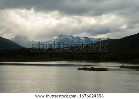 
Coast with mountains and clouds in Ushuaia, Argentina.