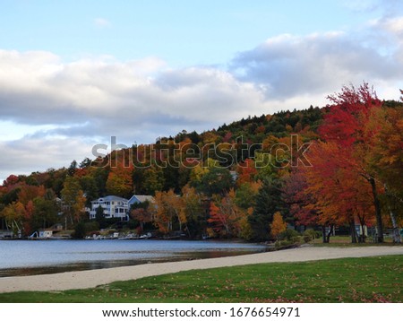 Pretty autumn scene from Lake Sunapee beach, New Hampshire.