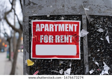 Apartment for rent sign on a textured background