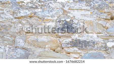 Texture, background, pattern. Paving stones, Ancient building, Mortar, connecting blocks of lime with sand mortar