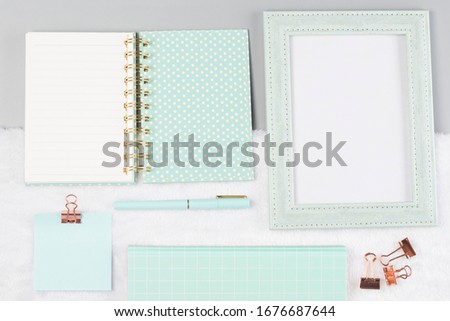 flat lay stationery on work desk in gray pastel background	

