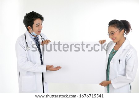Asian Chinese Malay male female doctor holding posing showing pointing blank expression happy exited white paper board on white background