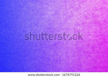 Multi-colored metal textured background with a gradient.