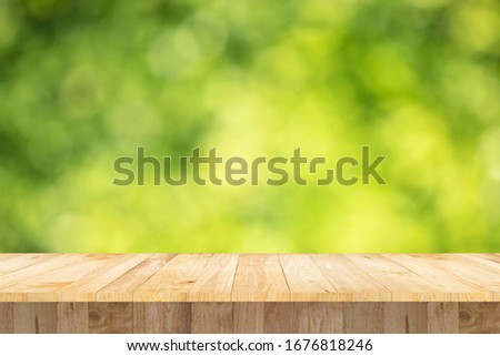 display product blank table advertising object texture green bokeh background Royalty-Free Stock Photo #1676818246