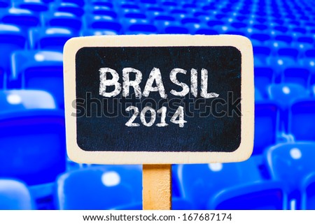 Brasil soccer 2014 Small wooden framed blackboards on soccer stadium background 