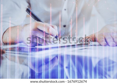 Multi exposure of man planing investment with stock market forex chart.