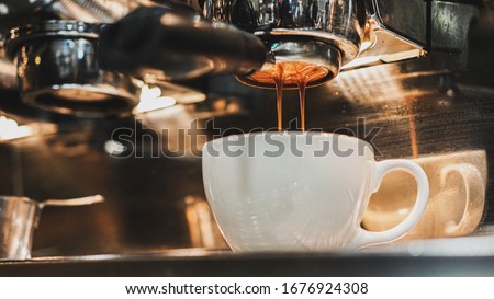 It is a photograph of espresso extraction. I put it in a wonderful photo with the moment of extracting espresso. Royalty-Free Stock Photo #1676924308
