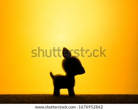 Silhouette of a toy figure in the shape of a roe deer