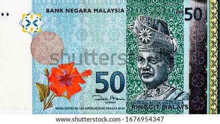 COUNTING MALAYSIAN RINGGIT BANK NOTES Stock Photos and Images