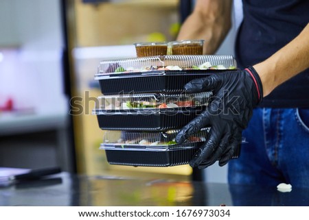 Vegetable salad with smoked eel in box ready for eating. Japanese Food Delivery Service Royalty-Free Stock Photo #1676973034