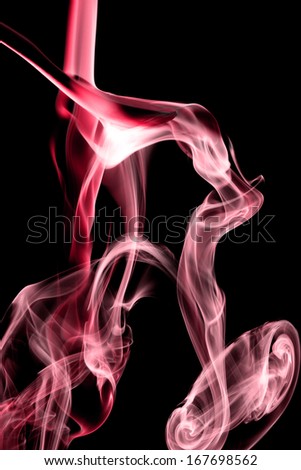 Red smoke on natural black background