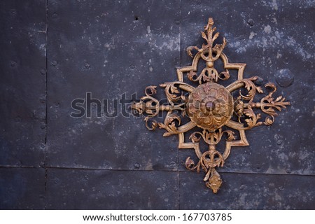 Ancient decorative ornament on metal plate - high resolution background Royalty-Free Stock Photo #167703785
