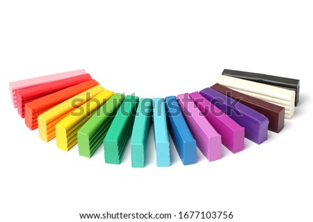 A large set of colored plasticine for childrens creativity and needlework, copy space, close-up, isolate, white background.