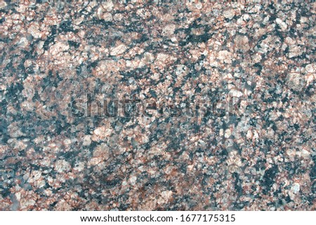 Closeup of grey granite texture background.