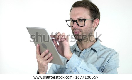 Casual Man Browsing Interne on Tablet, White Background