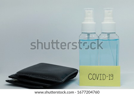 Wallet with spray bottle And anti covid-19 on memo post