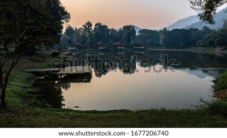 Reflection of the sky in the morning lake
