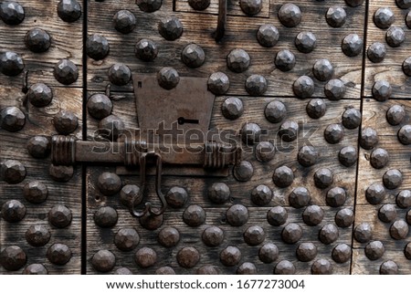 image of an ancient medieval wooden door
