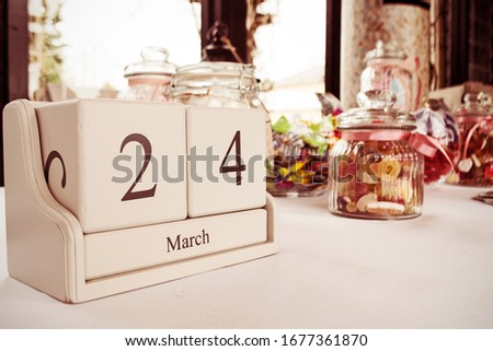 An image of a selection of sweets at a wedding, showing a date of March 24th