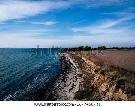 drone shot of the cliffs in wulfen on fehmarn germany Royalty-Free Stock Photo #1677458731