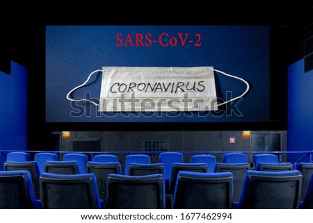 large Billboard in the form of a cinema monitor, convey information through the screen in the cinema hall. large advertising layout. Royalty-Free Stock Photo #1677462994