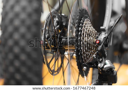 Close up photo of bicycle 11 speed rear cassette with transmission. Shallow depth of field
