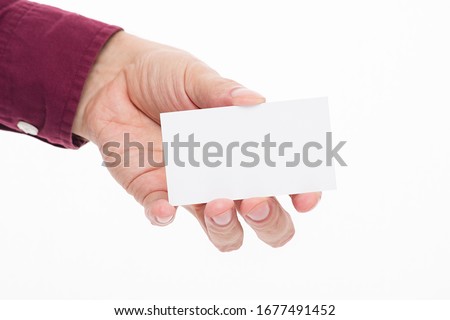 male hand with business card