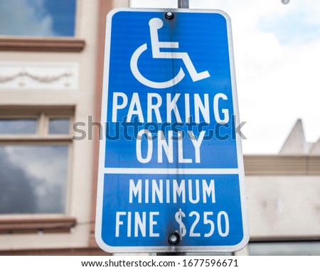 Handicap parking by disable permit only $250 fine sign