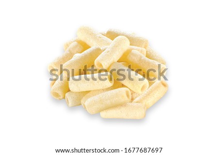 Fried and Spicy Tasty yellow white salted pipe, Salted Refill, Most famous and delicious wheat flour snack Children love them very much Snacks or Fryums, Frymus (Snacks Pellets) Royalty-Free Stock Photo #1677687697