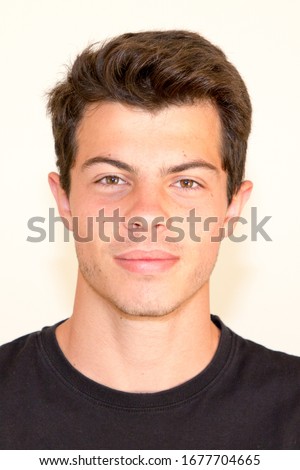 young handsome man portrait for passport driver licence document id photo concept
