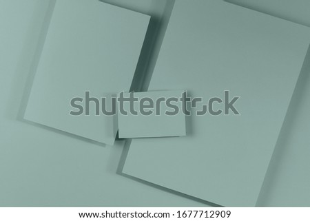 Mosk up. Abstract paper pastel color background. Three cards on different sizes on the surface of the same color. Close-up, horizontal, flat lay, free space. Toning.