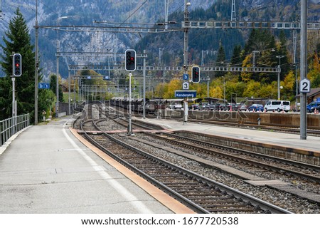 Row of cars to get in to the trains at Kandersteg  trainstation transit to Goppenstein Switzerland.
