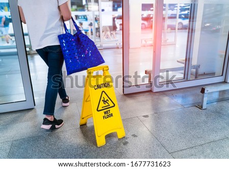 "Caution wet floor" sign in mall