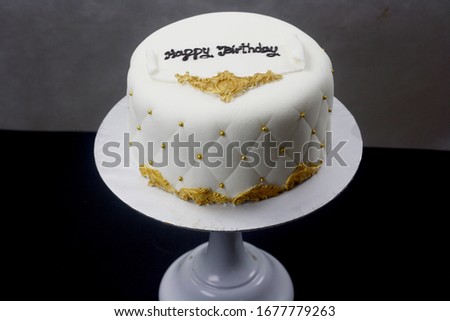 Luxury vintage white and gold cake