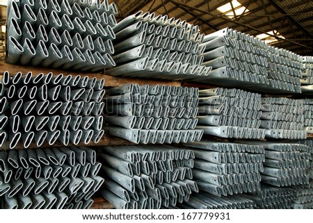 Steel tubes bunch on the rack in warehouse