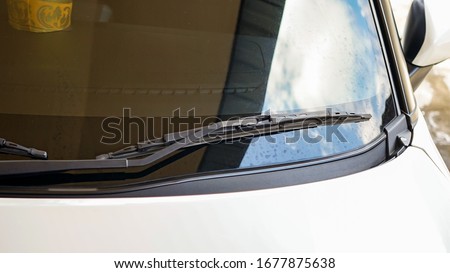 Close up of the front wiper of the car Royalty-Free Stock Photo #1677875638