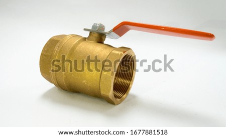 Golden water valve with white background.