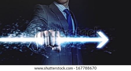 Businessman holding lightning in fist. Power and control Royalty-Free Stock Photo #167788670