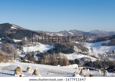 Forests and villages in jilin, China, after snow in winter