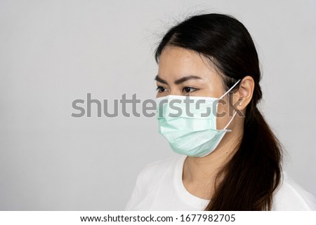 Woman waring protection mask from coronavirus and air pollution isolated on white background,Health care concept