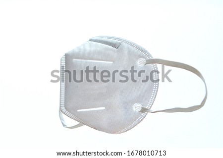 KN95 or N95 mask for protection pm 2.5 and corona virus (COVID-19).Anti pollution mask.air face mask.N95 mask with white background. Royalty-Free Stock Photo #1678010713