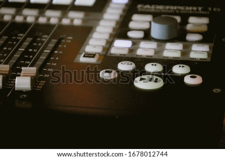 Music equipment broadcasting tools with buttons on control desk