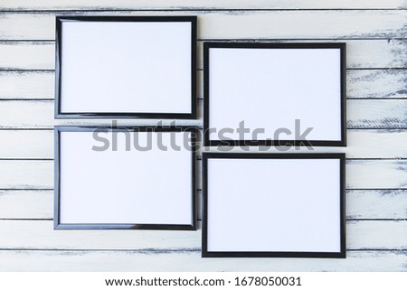 Blank frames on white vintage distressed background
