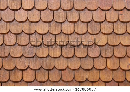 Wooden shingles on house wall