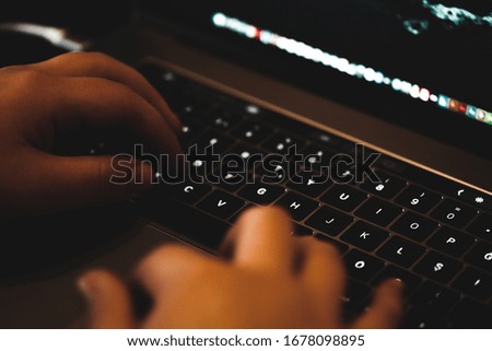 male company employee working on computer typing on keyboard sitting at office desk, corporate information online technology and pc business software close up view of hands on device