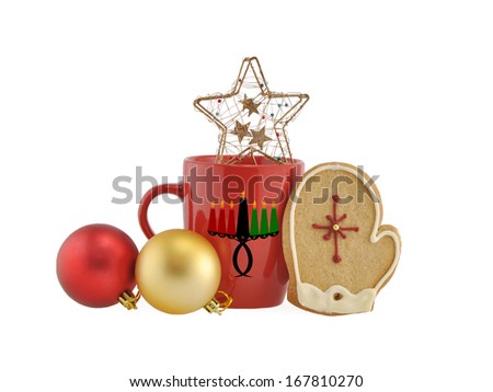 Kwanzaa Kinara (Swahili for Candle Holder) Red Mug Christmas Star Decorations Mitten Butter Cookies decorated with icing snowflake isolated on white background