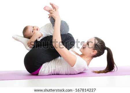 Mother doing yoga exercise with her baby Royalty-Free Stock Photo #167814227